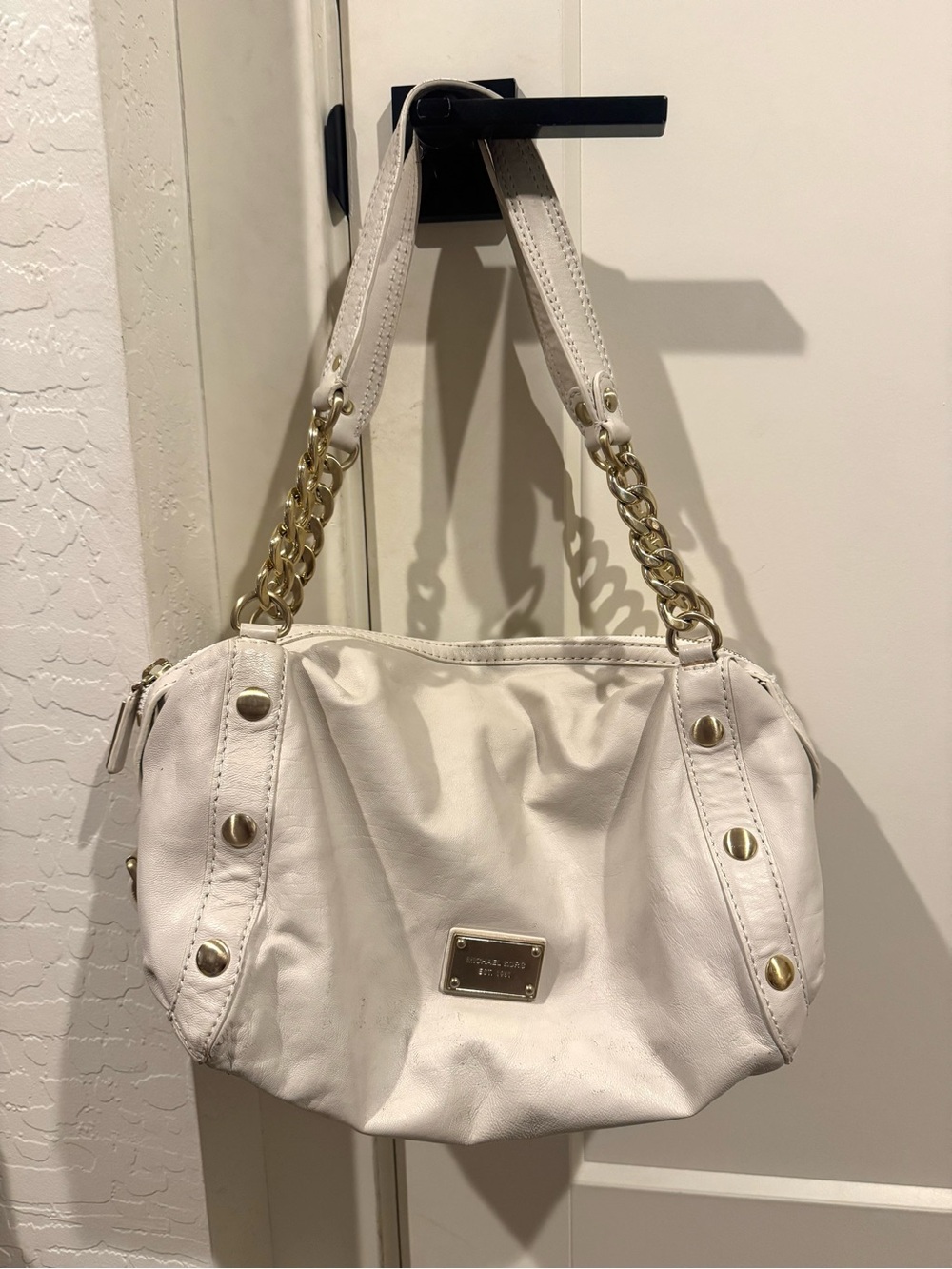 MICHAEL KOR’S Vanilla Genuine Leather Satchel Bag w/Gold Chain Accents has tags